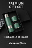 Green vacuum flask and mugs set in a black box with text on a dark background